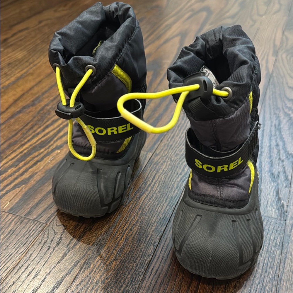Sorel Black and Yellow Rain & Snow Boots with Waterproof Design